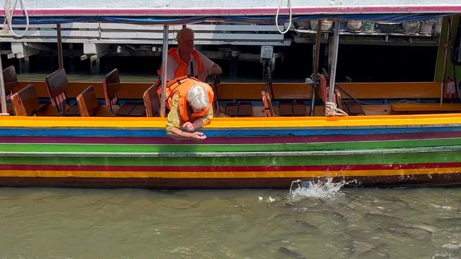 2 Hrs Private Bangkok Canal Boat Tour: Traditional Flat Boat - Fish Feeding and the Slower Rhythm of the Canals
