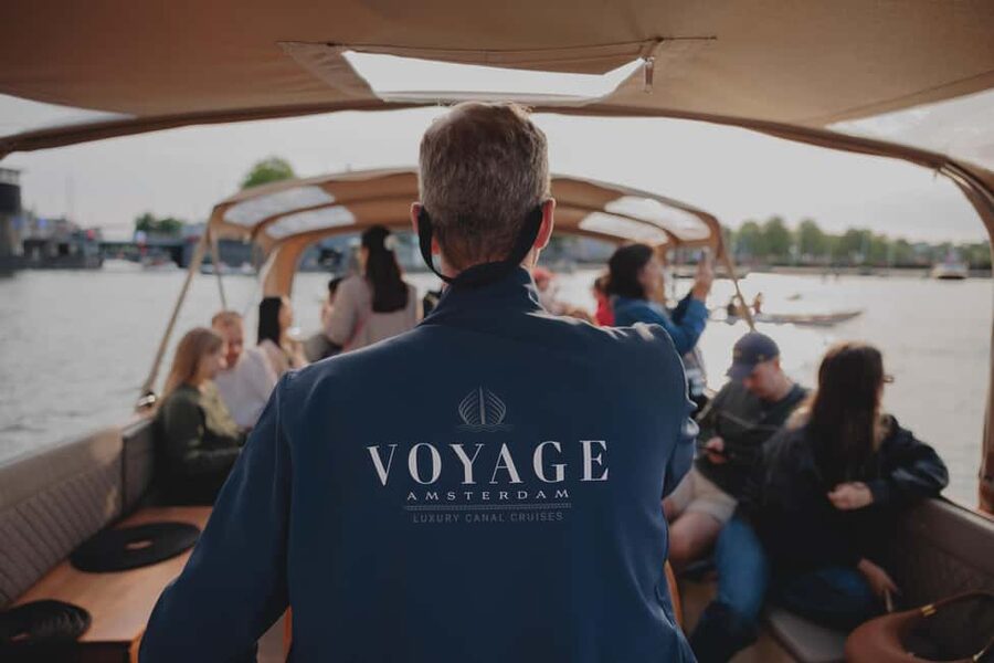 Amsterdam: 1.5-Hour High-End Morning Breakfast Canal Cruise - Boarding a Heated Luxury Boat