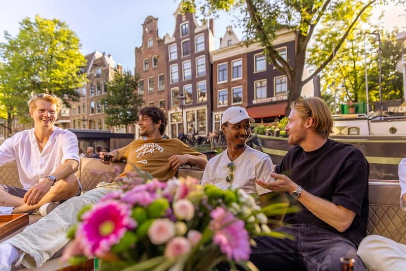 Amsterdam: 2-Hour Luxury Canal Cruise with Snacks & Drinks - Crossing the Skinny Bridge and the eastern canals