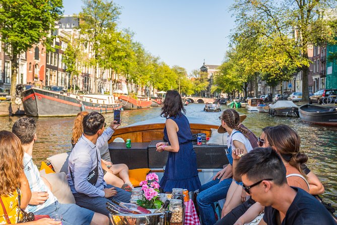 Amsterdam All-Inclusive 90-Minutes Heated Cruise by Captain Jack - Hearing the captain on a small boat