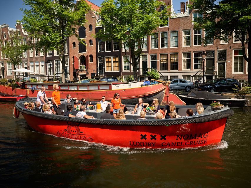 Amsterdam: Canal Belt Private Beer Boat Tour - Four beers and the rhythm of the cruise
