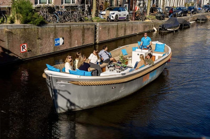 Amsterdam: Canal Cruise in Open Boat with Drink Option - What the open boat feels like