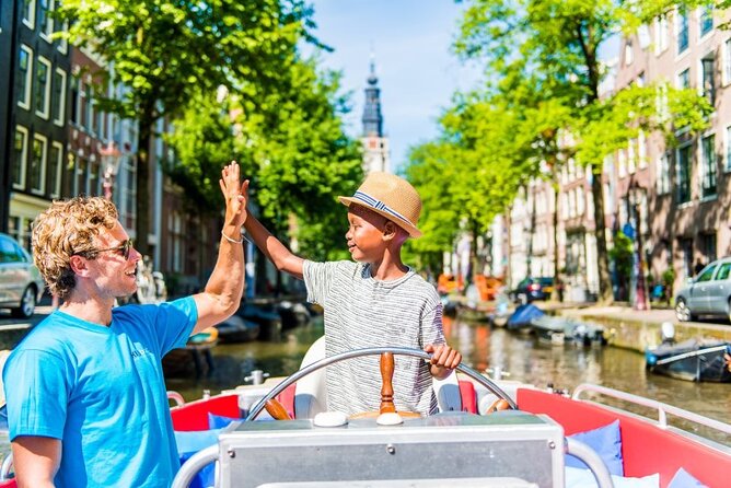 Amsterdam Canal Cruise in Open Boat with Unlimited Drinks Option - Boarding a Small, Quiet Electric Boat