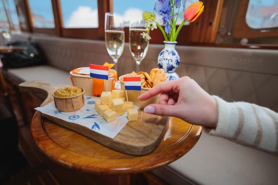Amsterdam: Canal Cruise with Bubbles & Bites - Red Light District views without a long walking tour