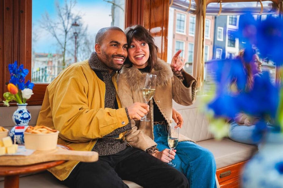 Amsterdam: Canal Cruise with Bubbles & Bites - Bubbles, cheese, crackers, and mustard