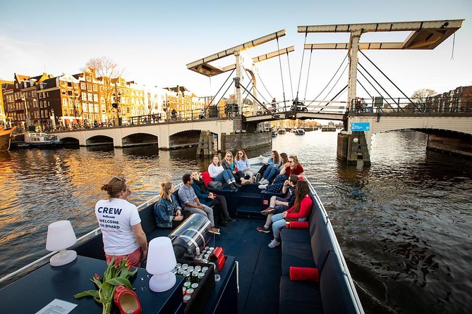 Amsterdam Canal Cruise With Live Guide and Unlimited Drinks - Herengracht, Prinsengracht, and the Jordaan