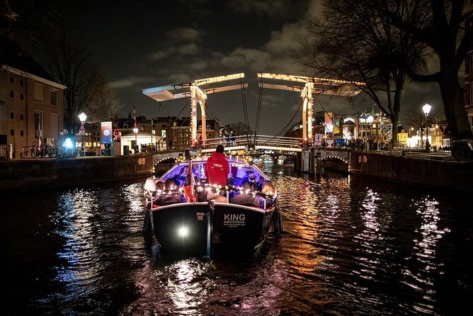 Amsterdam Canal Cruise With Live Guide and Unlimited Drinks - Small museums, old houses, and changing views