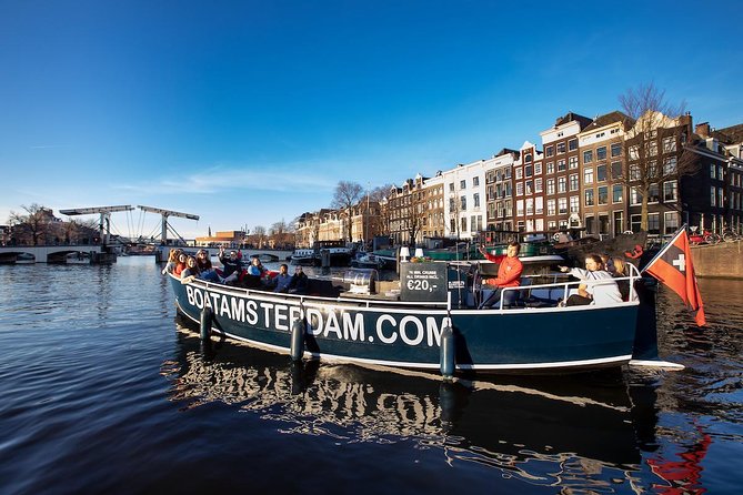 Amsterdam Canal Cruise With Live Guide and Unlimited Drinks - From Amstel 51F to the Magere Brug