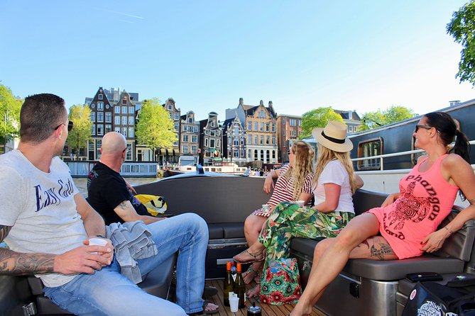 Amsterdam Canal Tour by Open Boat – 90 min Small Group Experience - Why a small boat changes the Amsterdam canal ride