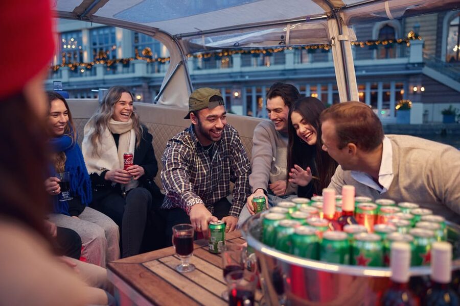 Amsterdam: Covered Canal Booze Cruise with Unlimited Drinks - The boat, group size, and comfort