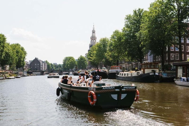 Amsterdam Evening (Sunset) Canal Cruise w/ optional drinks - Open boat, covered boat, or a cold-weather compromise