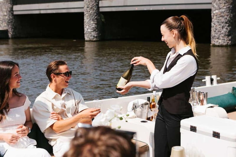 Amsterdam Evening (Sunset) Canal Cruise w/ optional drinks - Finding the boat beside Central Station