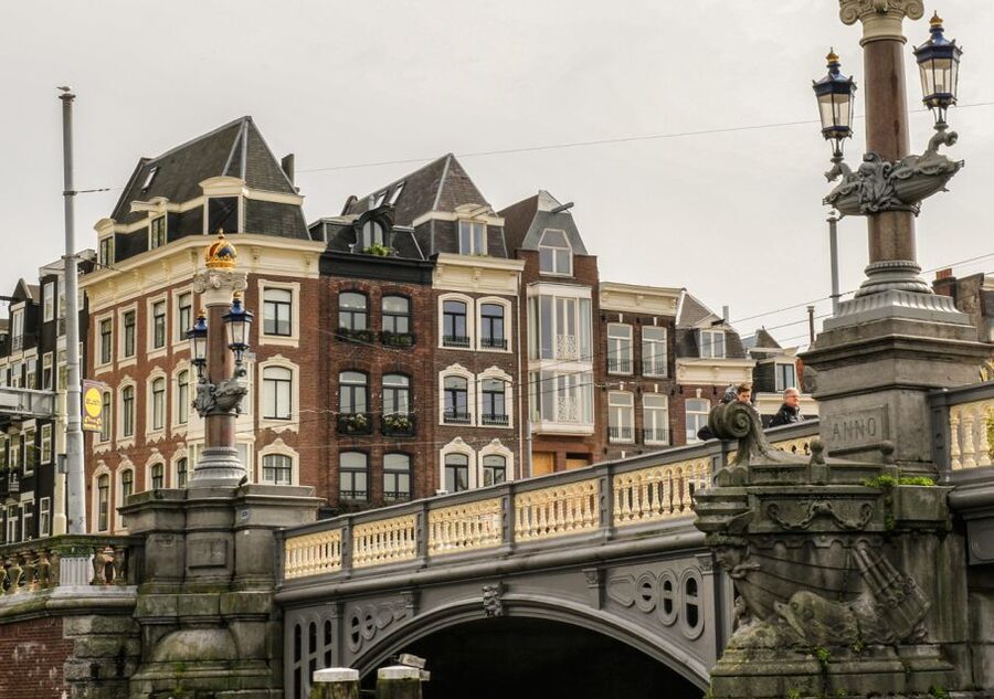 Amsterdam: German Canal Cruise with Unlimited Drinks Option - Herengracht and Amsterdam’s canal belt