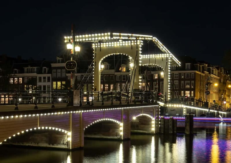 Amsterdam: German Canal Cruise with Unlimited Drinks Option - Crossing the Amstel toward Magere Brug