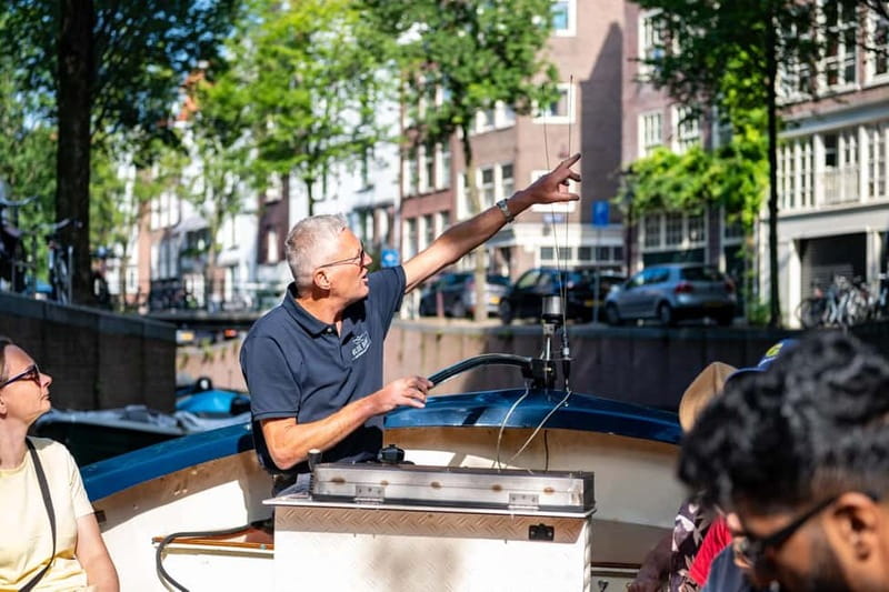 Amsterdam: Guided City Highlights Open Boat Canal Cruise - Key points to know before booking