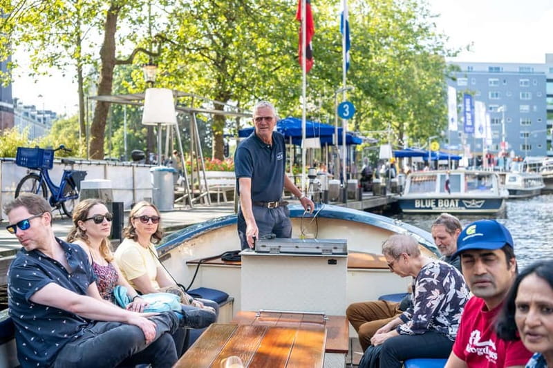 Amsterdam: Guided City Highlights Open Boat Canal Cruise - From Leidseplein to Amsterdam’s central canals