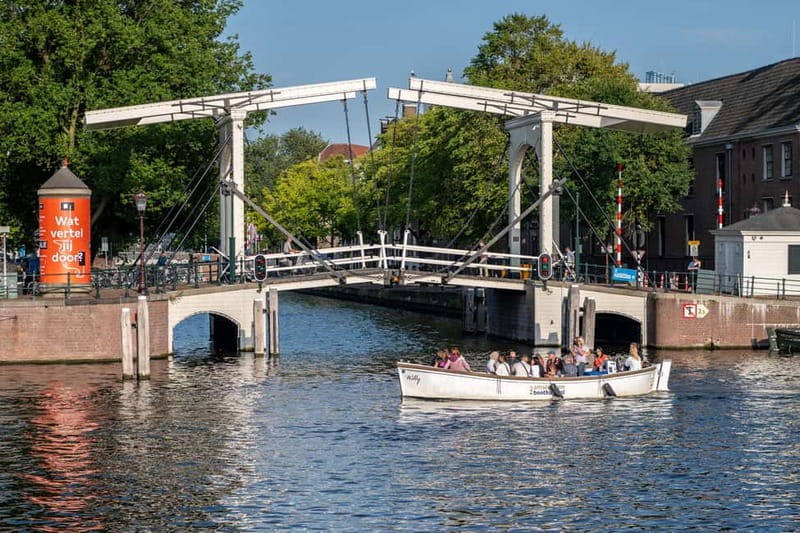 Amsterdam: Guided City Highlights Open Boat Canal Cruise - What the captain commentary is really like