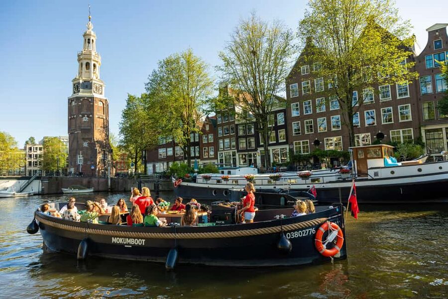 Amsterdam: Guided Open Boat Canal Cruise Including Drink - One drink or an unlimited drinks upgrade