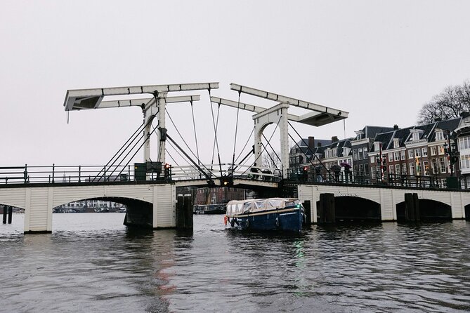 Amsterdam Newest Canal Cruise with local guide and small group - Historic towers and the old harbor edge