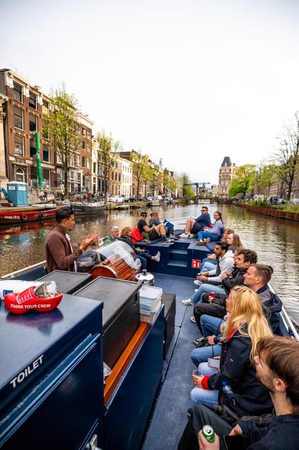 Amsterdam:Old City Canal Cruise with Live Guide and Open Bar - Key points at a glance