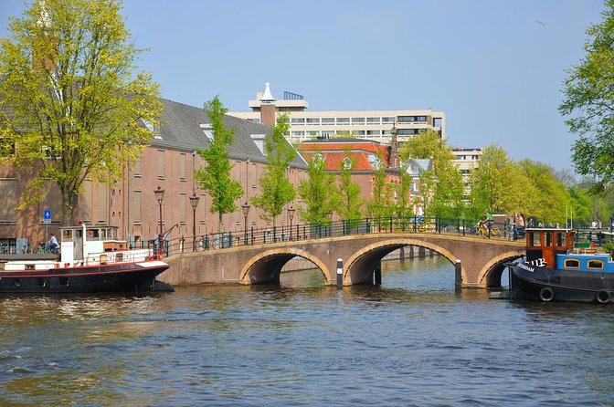 Amsterdam Open Boat Cruise with Live Guide and Two Drinks - Key points to know before you book