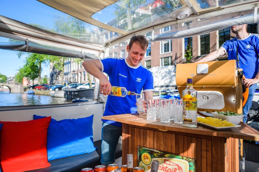 Amsterdam: Private Canal Booze Cruise with Unlimited Drinks - Prinsengracht and the long sweep of Herengracht
