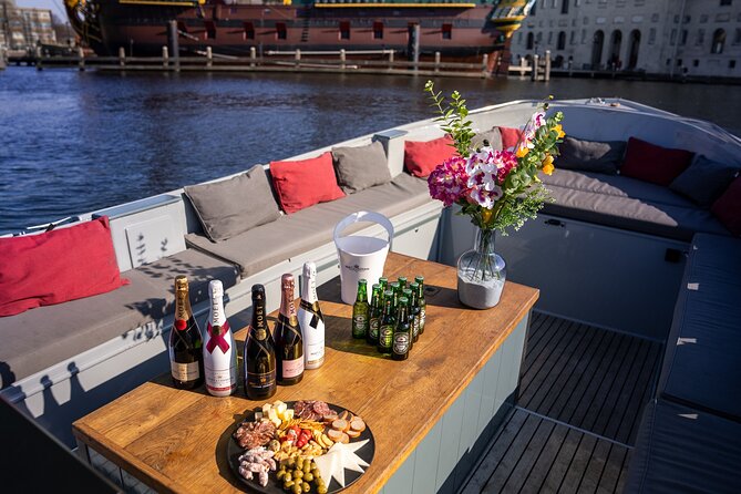 Amsterdam: Private Canal Cruise with Drinks and Snacks - The Amstel River, Skinny Bridge, and Hermitage