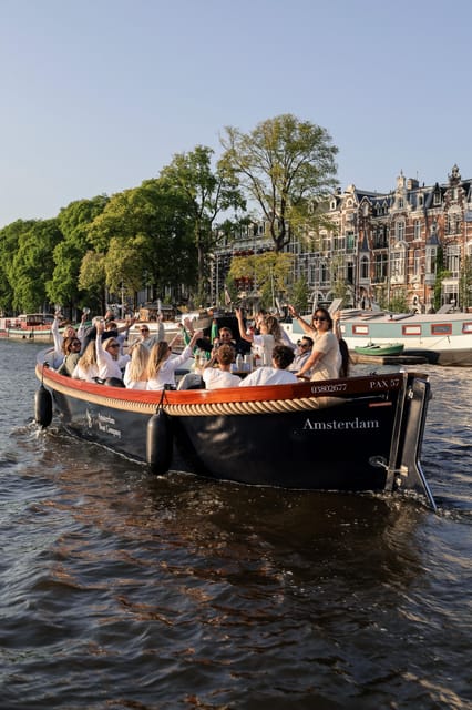 Amsterdam: Private City Canal Cruise With Unlimited Drinks - Meeting the Blue Boat at Central Station