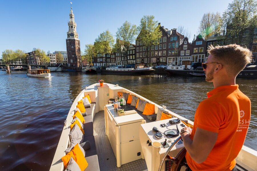 Amsterdam: Private Prosecco Canal Cruise Tour - Meeting the boat near Amsterdam Central