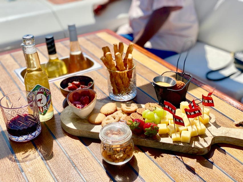 Amsterdam Small Group Canal Cruise inc Snacks/Drinks Winter - The first hour: bridges, canal houses, and local stories
