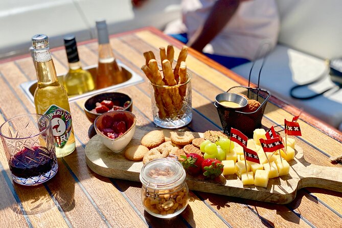 Amsterdam Small-Group Canal Cruise Including Snacks and Drinks - Maritime Museum, the East Indiaman, and Hortus Botanicus