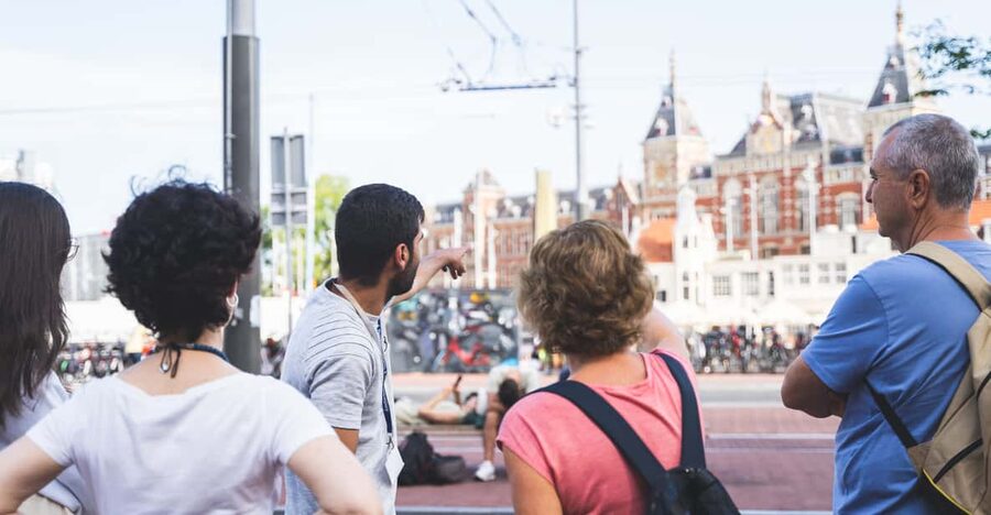 Amsterdam Small-Group Walking Tour with Canal Cruise - Dam Square, the City’s Big Public Stage