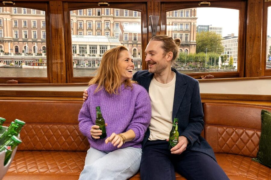 Amsterdam: The Heineken Flagship Canal Cruise - Guides who add warmth to the short cruise