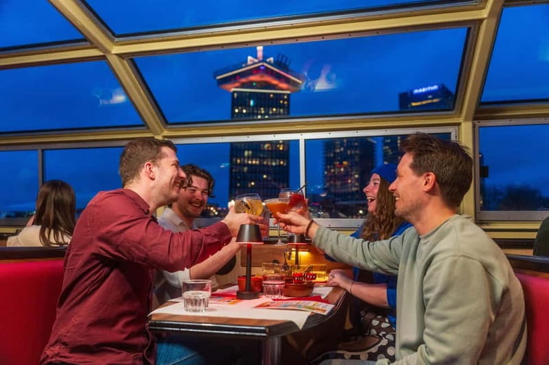 Amsterdam: Unlimited Cocktails Cruise on the Canals - Hotel Seven Bridges and the return to Damrak