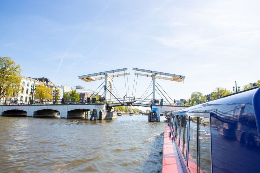 Amsterdam: Van Gogh Museum Ticket and City Canal Cruise - Walking from Museumplein to the canal dock