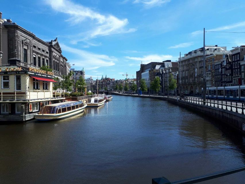 Amsterdam Walking Tour and Canal Cruise - The 60-minute canal cruise changes the view