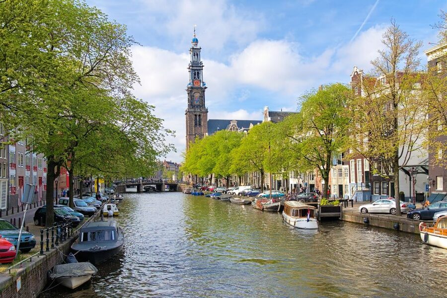 Amsterdam Walking Tour and Canal Cruise - Starting with Dam Square and Amsterdam’s central story