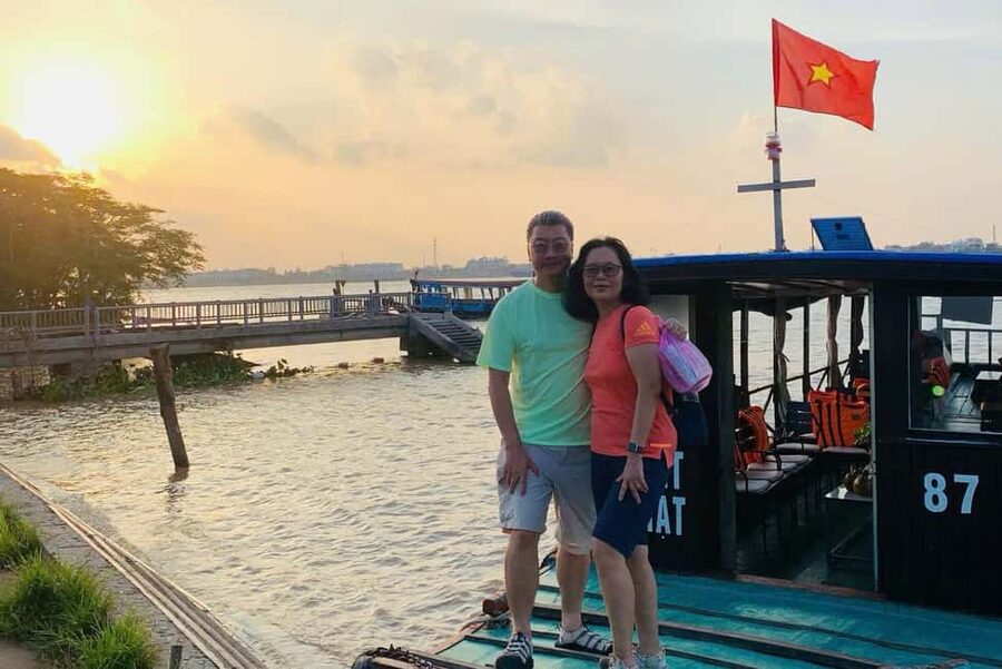 Authentic Mekong Delta: Tuk Tuk, Rowing Boat, Biking Tour - The rowing boat through the water coconut palms