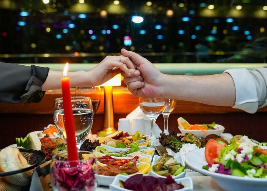 Bosphorus Evening Cruise: Dinner, Shows and Private Table - Leaving Kabataş as Istanbul lights up