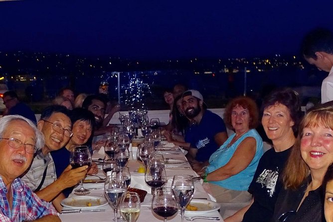 Bosphorus Night Cruise: Dinner, Drinks & Hotel Pickup - Dinner at a crowded table