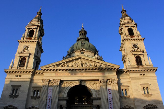 Budapest: Night Walking Tour with Danube River Cruise - Vigadó Concert Hall before boarding the boat