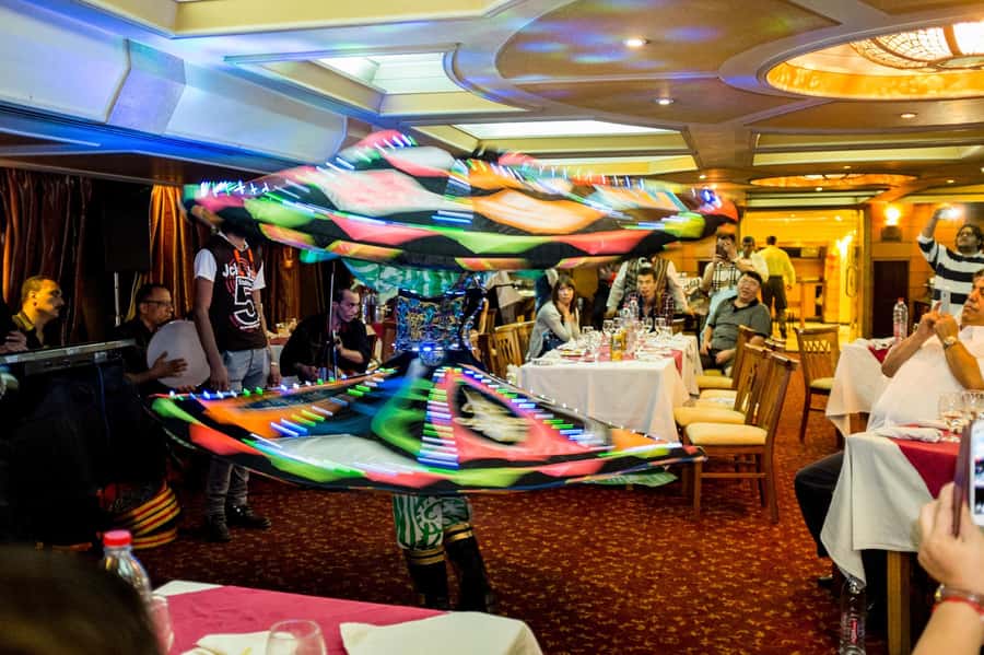 Cairo: Dinner Cruise on the Nile River - Boarding the dinner boat and finding your table