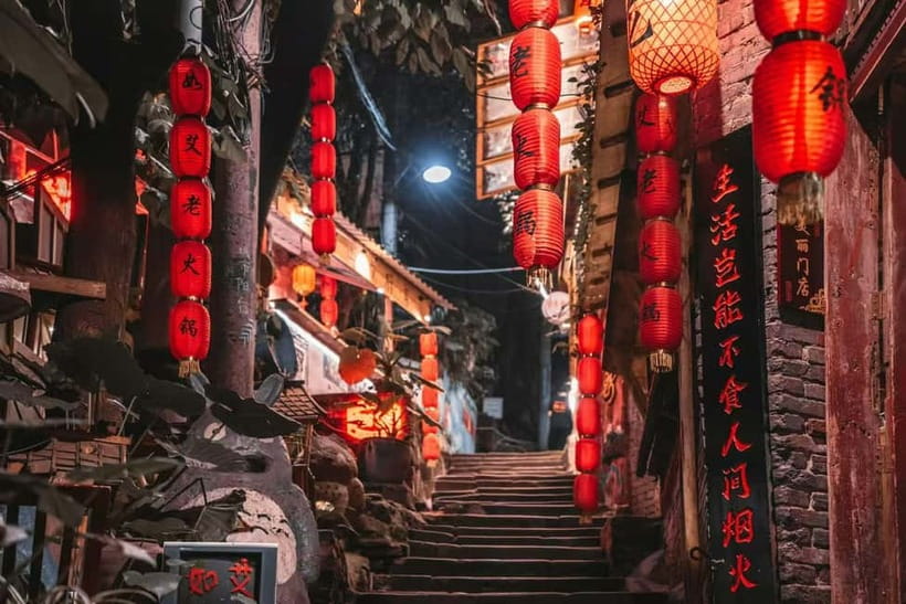 Chongqing Night Tour: River Cruise and Hidden Views - Hongya Cave and the glowing cliffside streets