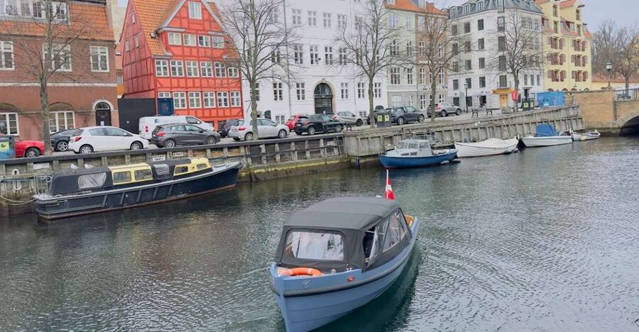 Copenhagen: Guided Canal Tour by Electric Boat - Old harbor views and newer waterfront buildings