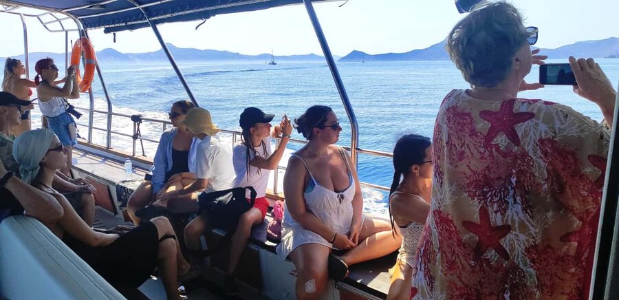 Corinth Canal Cruise: Ancient Ports, Crystal Waters &History - Lunch, wine, and the mood onboard