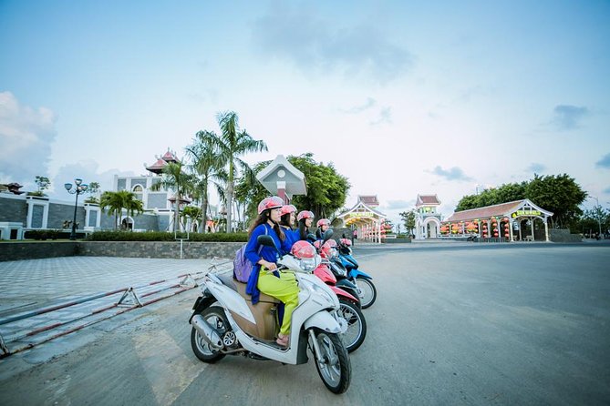 Da Nang Night Motorbike Tour & River Cruise Riding By Lady Rider - Dragon Bridge: the best first stop