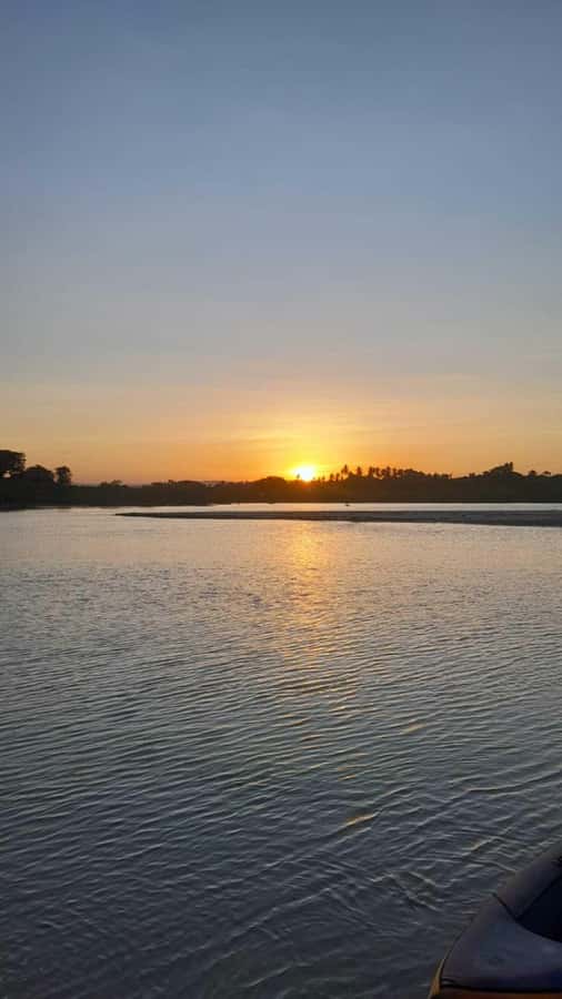 Diani: Sunset Cruise along Kongo River on Wooden Canoe boat - Boarding the traditional wooden canoe at Kongo Beach