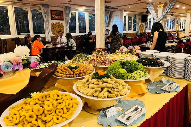 Dinner Cruise on Saigon River with Private Table - Sailing past Ho Chi Minh City after dark