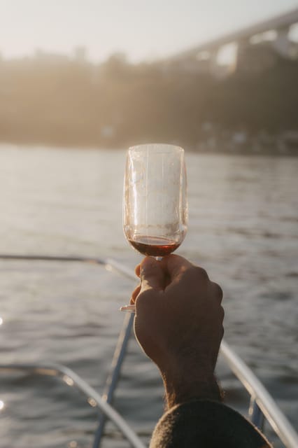 Douro River Cruise with Cheese & Tonic Porto in a Sailboat - Afternoon light or sunset over the Atlantic