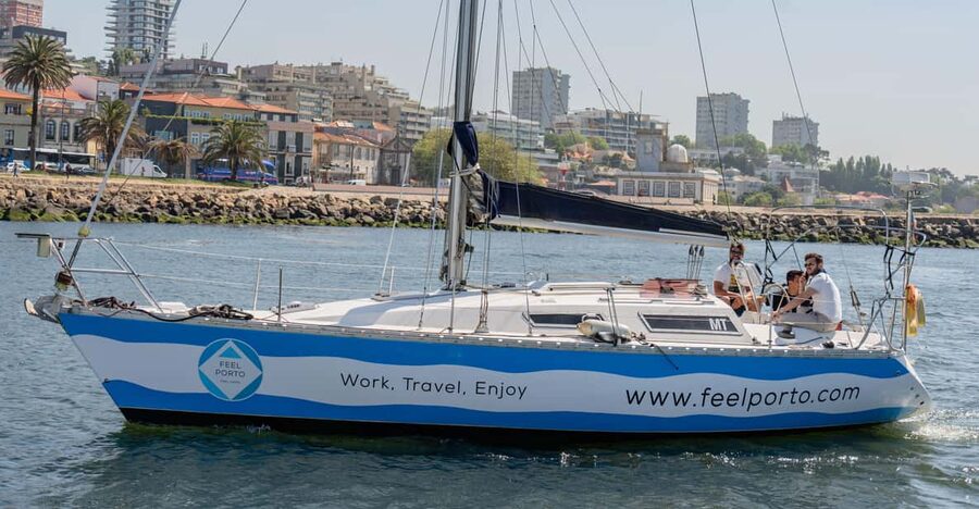 Douro River Cruise with Cheese & Tonic Porto in a Sailboat - Passing beneath Arrábida Bridge